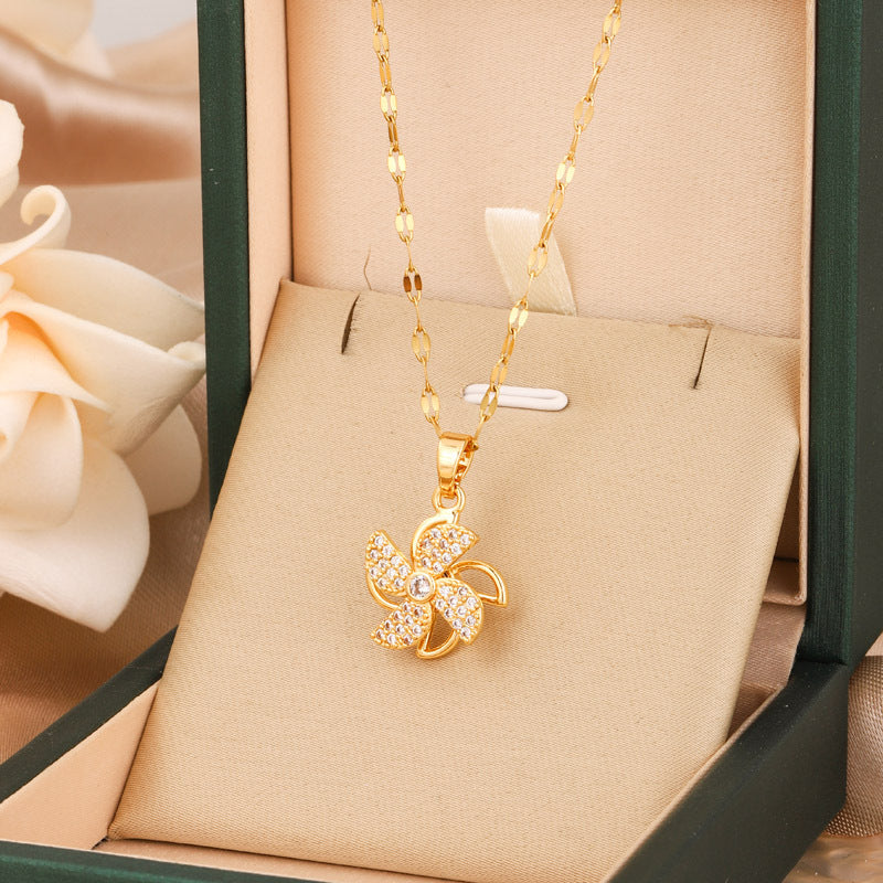 Luxury Rotating Four-Leaf Clover Windmill Necklace – Gold Titanium Steel
