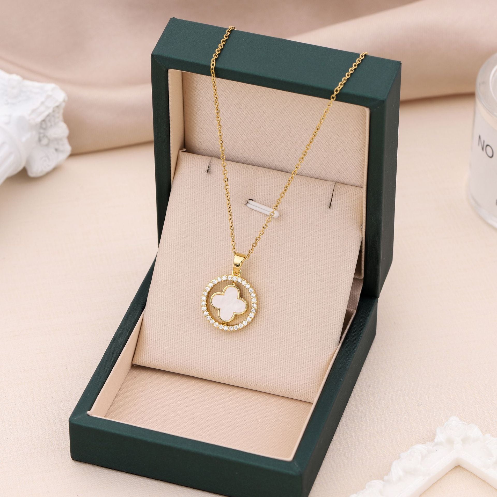 Luxury Double-Sided Rotating Four-Leaf Clover Necklace – Gold Titanium Steel