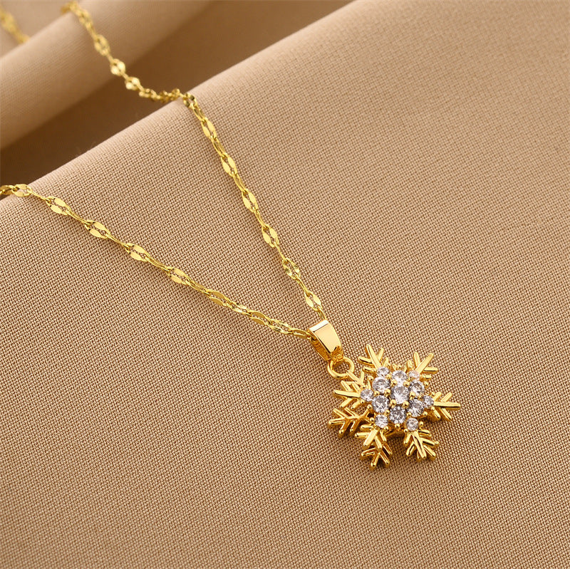 Luxury Rotating Snowflake Pendant Necklace – Gold Titanium Steel