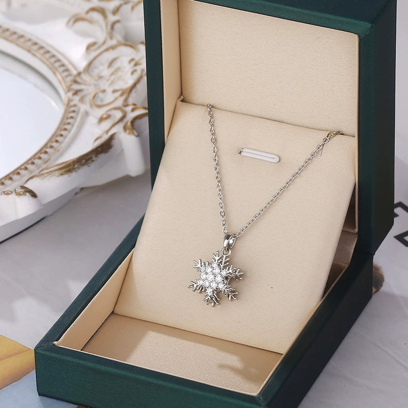 Luxury Rotating Snowflake Pendant Necklace – Gold Titanium Steel